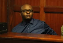 IEBC officials and Nairobi Law Courts building during tender fraud hearing